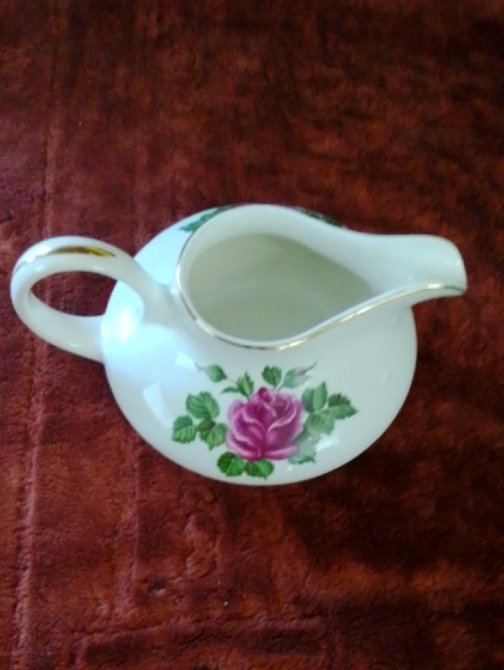 The Harker Pottery Ca a rose design and is accented with 22k Gold KT U.S.A
